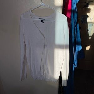 cream colored cardigan